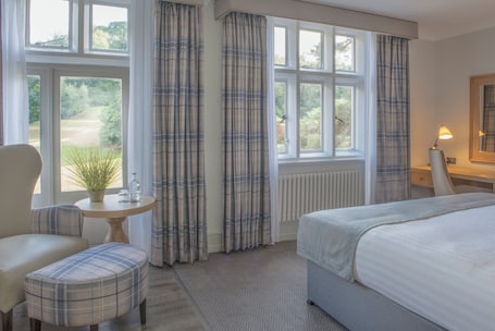 Premium Double Room, Garden View | In-room safe, desk, laptop workspace, iron/ironing board