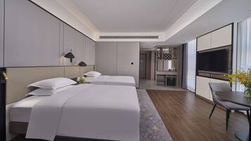 Habitación Deluxe, 2 camas individuales (Executive) | Edredón, caja de seguridad en la habitación y decoración personalizada