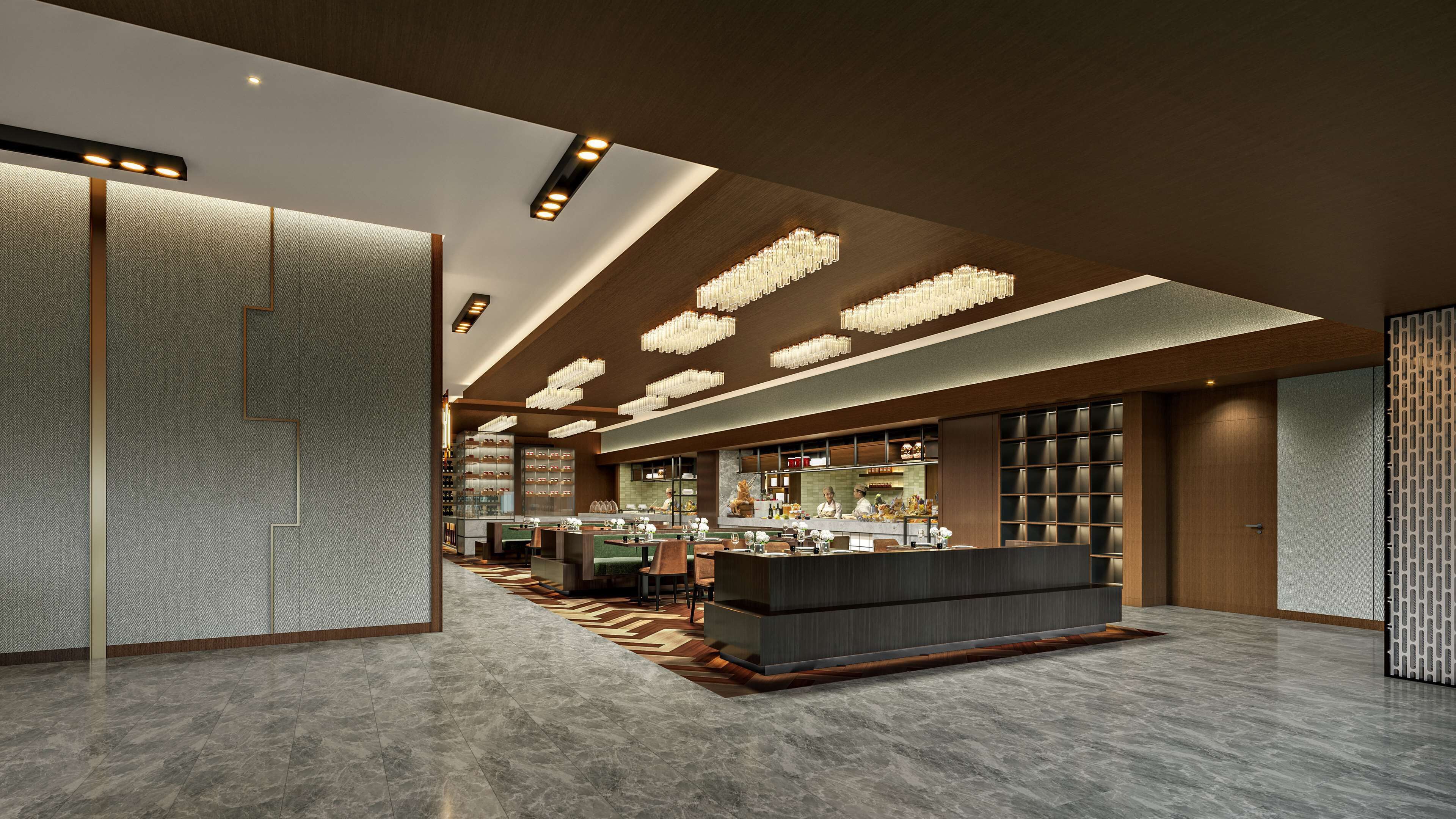 Un moderno vestíbulo de hotel con una recepción central, una zona de bar y un espacio para sentarse.
