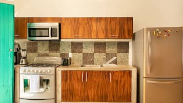 Department A: 1 bedroom king size bed | Private kitchen | Microwave, oven, coffee/tea maker, toaster