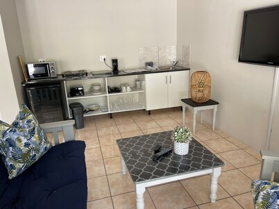 Beautiful luxury apartment, set in quiet area in a nice garden, 10 min from beach