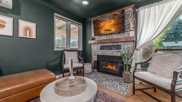 Smart TV, fireplace, books