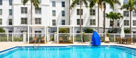 Outdoor pool, free cabanas, pool umbrellas