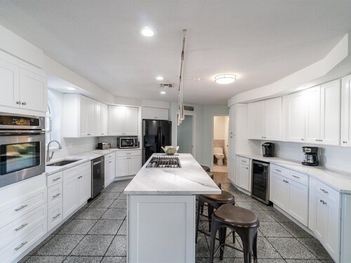 Reel Relaxin` ~ Luxury Waterfront Pool Home