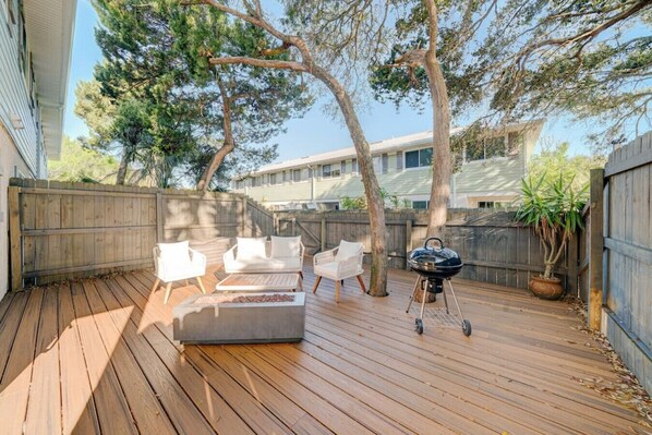 Enjoy al fresco dining on the deck with a barbecue grill and comfortable seating for four.