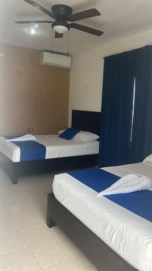Standard Double Room | Down duvets, Select Comfort beds, minibar, individually decorated - Hotel La Placita (Río Lagartos)