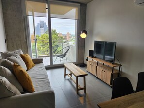 Apartemen Deluks | Area keluarga | TV