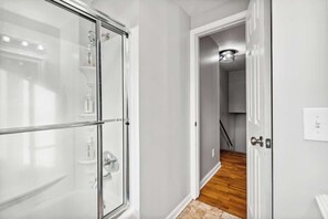 Combined shower/bathtub, hair dryer