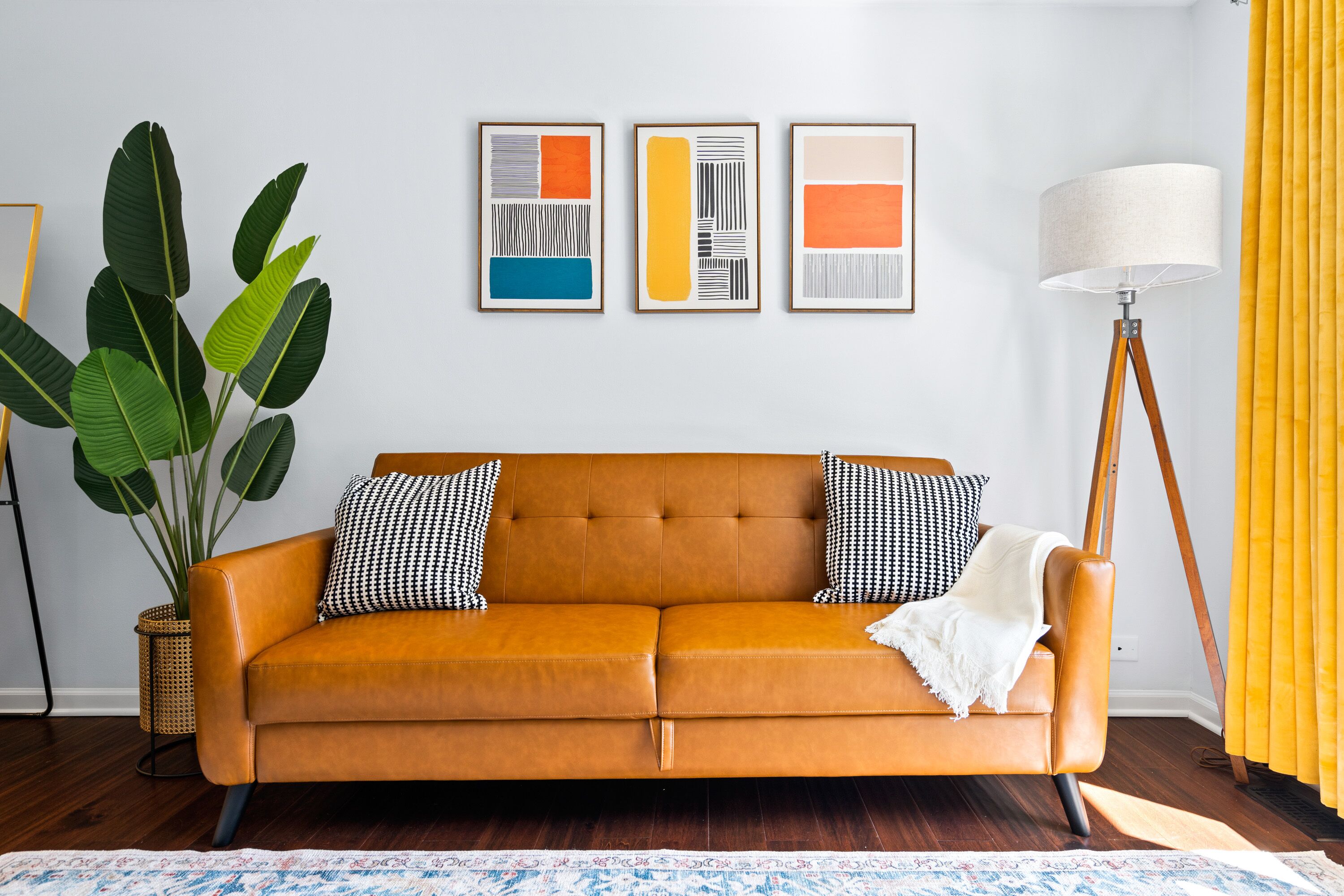 In this living room futon offering a convenient seating area during the day