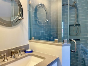Combined shower/tub, hair dryer, towels, soap