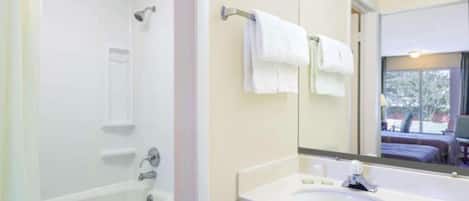 Rainfall showerhead, free toiletries, hair dryer, towels