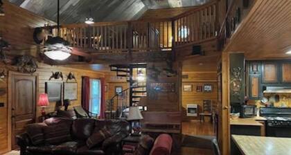 Cabin in the woods overlooking Grenada lake.