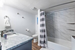 Hair dryer, towels, soap, shampoo