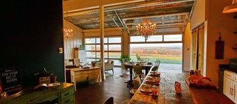 Sleep in a barn while enjoying the luxury accommodations  and friendly farm animals on property!