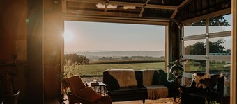 The West Barn is the ultimate getaway space- rent one side of the barn, or both