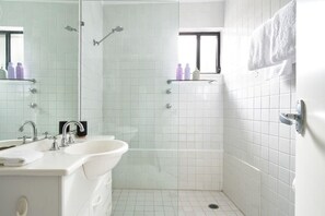 Bathtub, hair dryer, towels