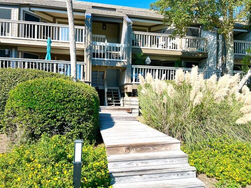 Beach Paradise with racquet club views near pool