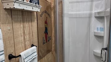 Shower, towels, soap, shampoo