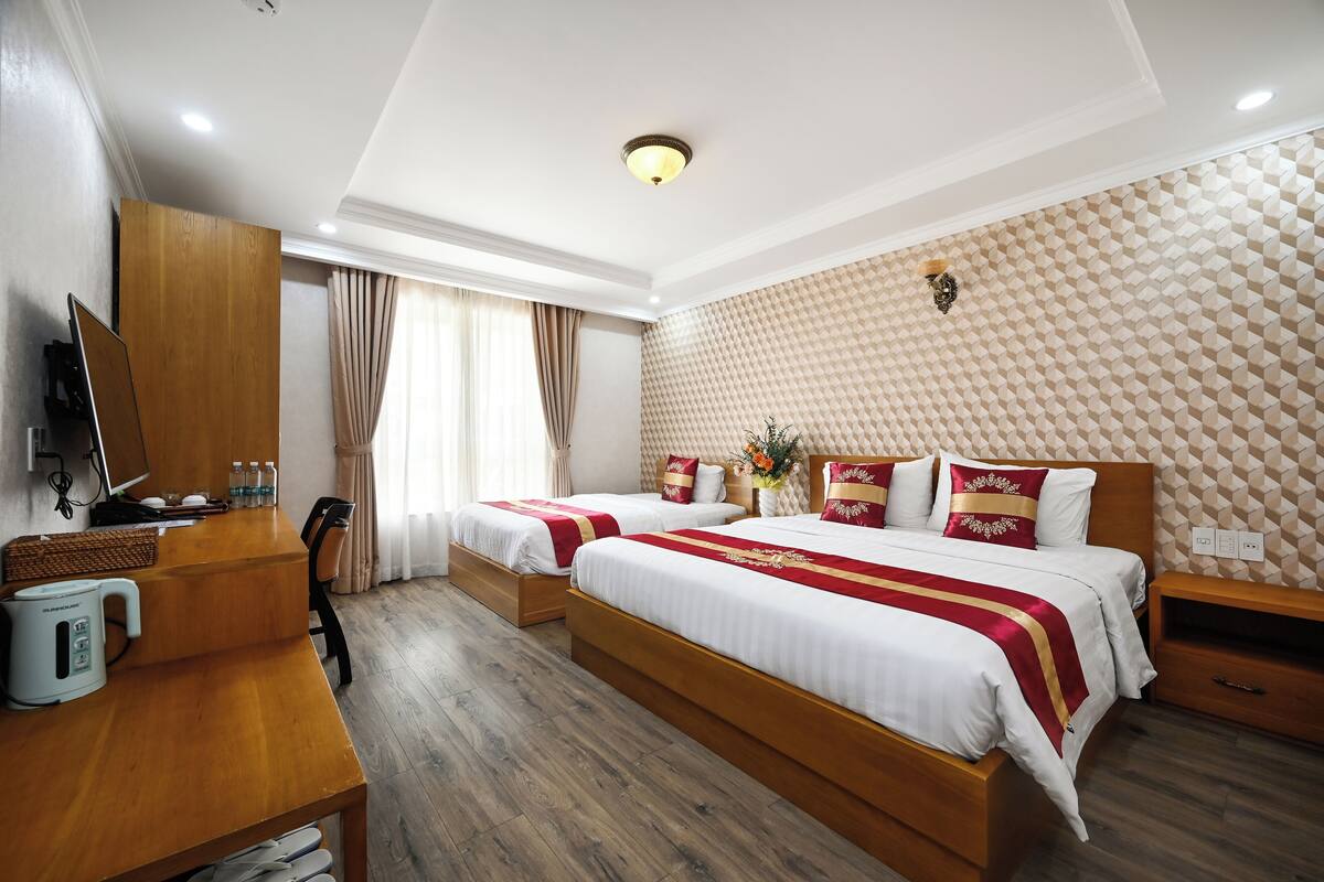 Kamar Triple Deluks | Minibar, meja kerja, kedap suara, dan setrika/meja setrika
