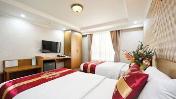 Habitación Deluxe con 2 camas individuales | Minibar, escritorio, sistema de insonorización