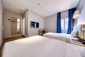 A modern hotel room with two beds, a TV, a desk, and a window with curtains. - 7 Days Premium (Chongqing Beibei Metro Southwest University Store) (Chongqing)
