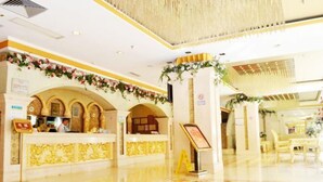 A hotel lobby with a reception desk, check-in counters, and a check-in area. - Moon Palace Hotel Huizhou (Huizhou)