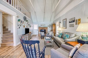 TV, fireplace, books, video library