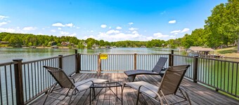 Waterfront lake-view home with dock, fireplace, pool table, kayaks, & firepit