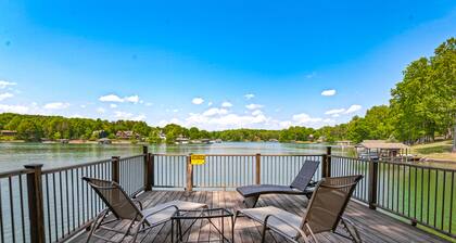 Waterfront lake-view home with dock, fireplace, pool table, kayaks, & firepit