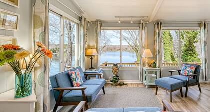 Waterfront lake-view home with dock, fireplace, pool table, kayaks, & firepit
