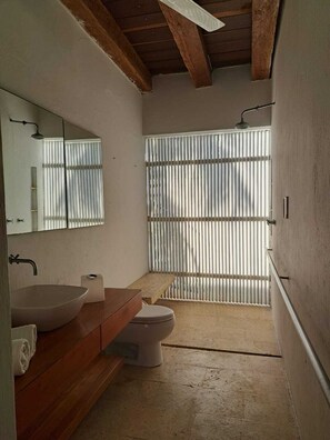 Shower, towels, soap, toilet paper