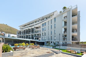 Experience the sleek, modern design of this hotel, featuring spacious balconies and a serene landscaped courtyard.