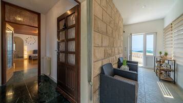 House (3bedroom holiday home,jacuzzi) | Living room | 25-inch flat-screen TV with satellite channels, TV