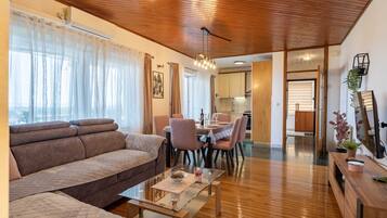 House (3bedroom holiday home,jacuzzi) | Living room | 25-inch flat-screen TV with satellite channels, TV