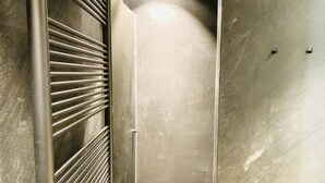 A corridor with a metallic railing and a smooth wall. - Beautiful Specious Design Duplex Penthouse With sea View (Knokke-Heist)