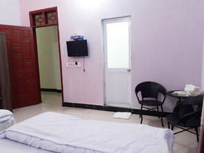 Desk, laptop workspace, free WiFi, bed sheets