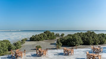 Breakfast, dinner served; international cuisine, beach views