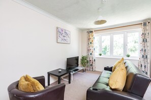 Deluxe-Zimmer | Wohnbereich | Smart-TV