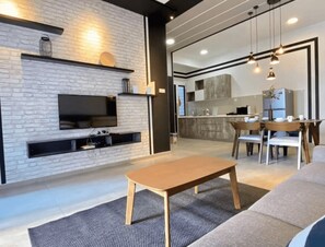 Superior Apartment | Living room | 40-inch LCD TV with cable channels - Atlantis Residences Melaka (Malacca City)
