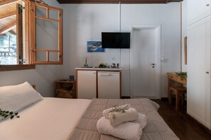 1 habitación, tabla de planchar con plancha, wifi gratis y ropa de cama 