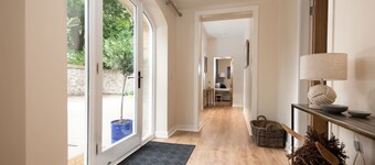 The Coach House sleeps six in three bedrooms