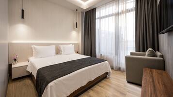 In-room safe, desk, blackout curtains, soundproofing