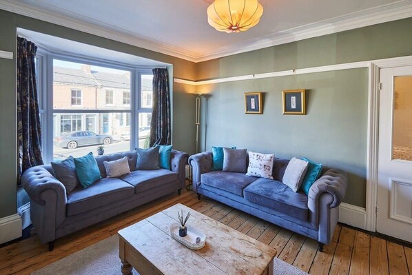 TV, fireplace, books, offices