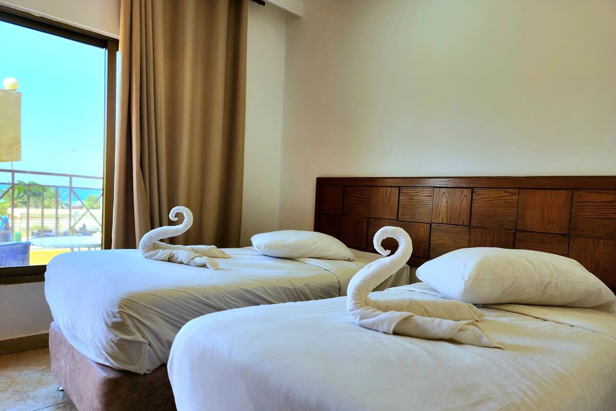 Deluxe Double or Twin Room, 1 Bedroom, Balcony, Sea View | Hypo-allergenic bedding available, down comforters, Tempur-Pedic beds