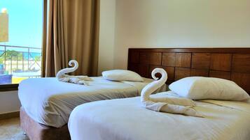 Deluxe Double or Twin Room, 1 Bedroom, Balcony, Sea View | Hypo-allergenic bedding, down comforters, Tempur-Pedic beds, minibar