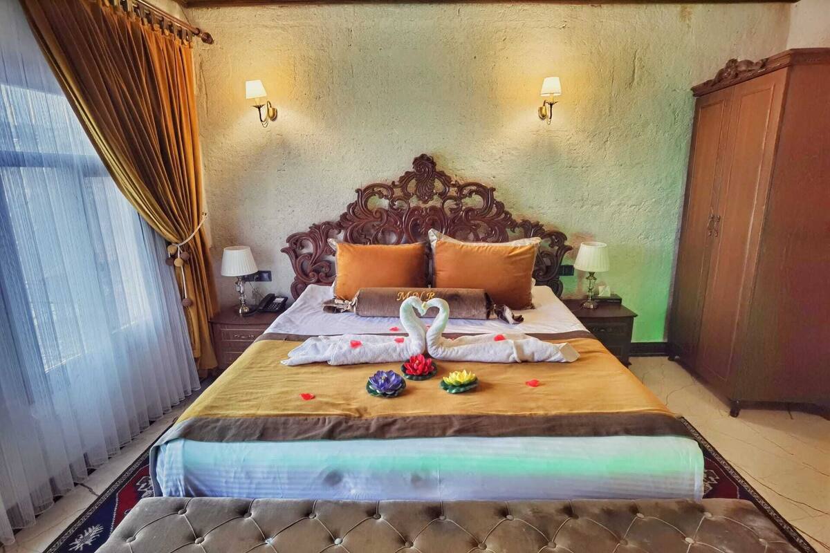 Premium bedding, down duvets, memory-foam beds, free minibar items