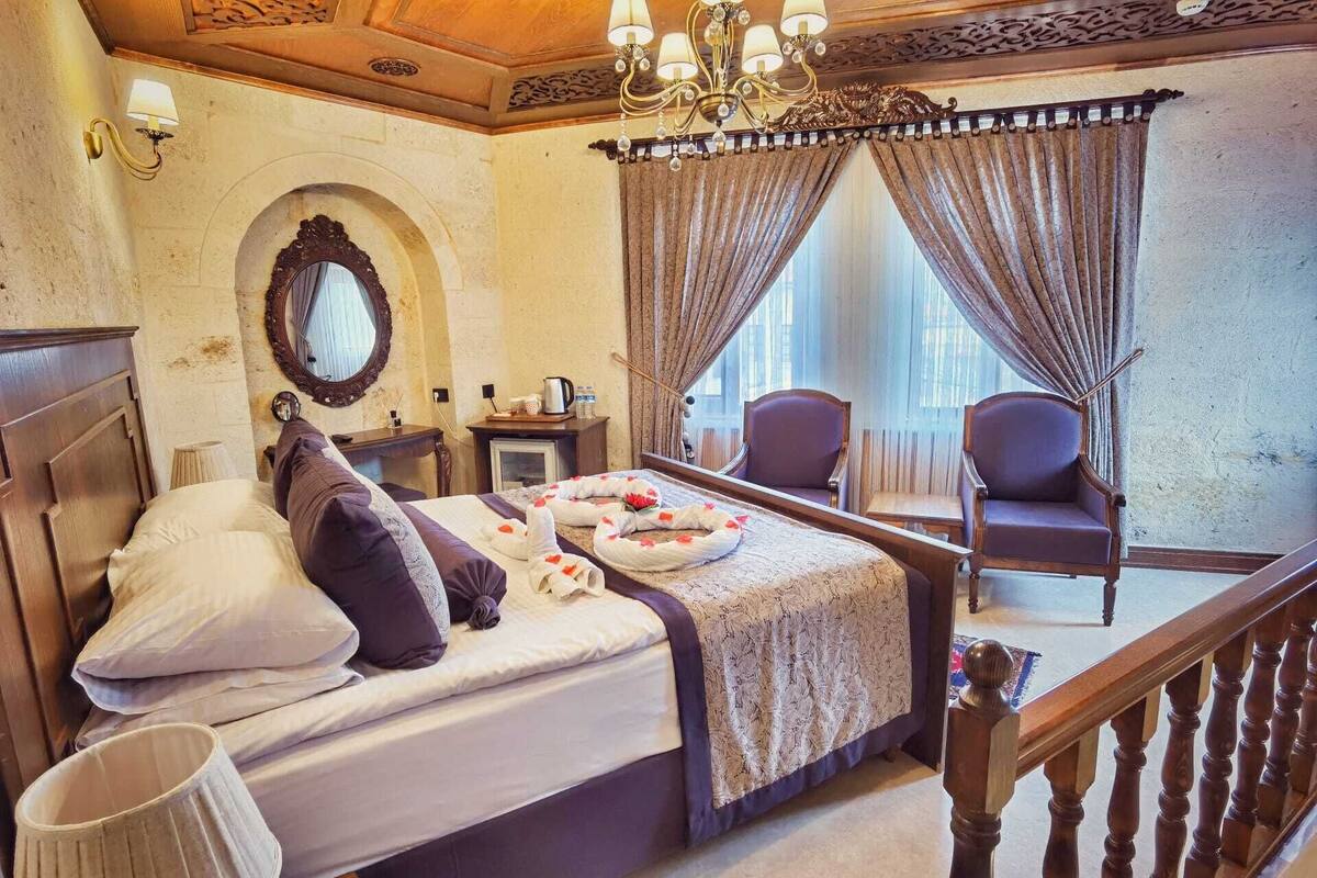Premium bedding, down duvets, memory-foam beds, free minibar items