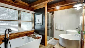 Bathtub, hair dryer, towels, soap