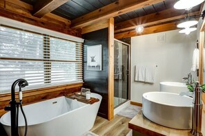 Bathtub, hair dryer, towels, soap