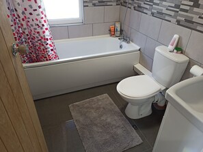 Combined shower/tub, hair dryer, towels, soap - Newport rental property,Furnished studio Near train station Free Wifi-Parrking. (Newport)